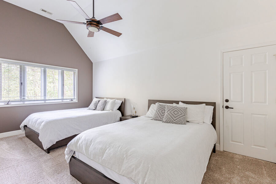 House for sale Franklin NC — bedroom with two beds and vaulted ceiling