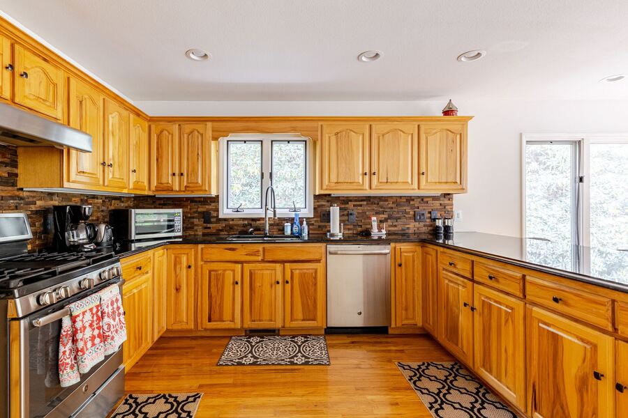 House for sale Franklin NC — kitchen with hickory cabinets